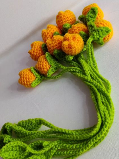 A bundle of yellow tulip bookmarks.