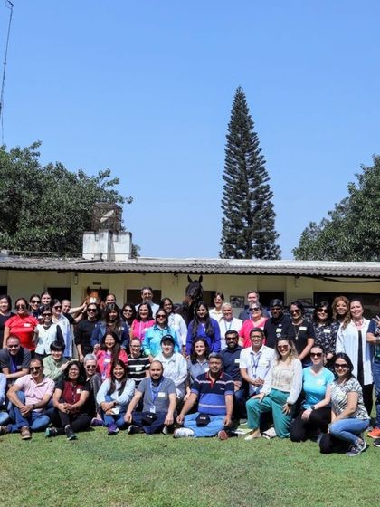A group photo of the IBM team after their inspiring Equine Assisted Learning session. Our programs are designed to empower teams and help them rediscover their potential in a unique, natural setting.