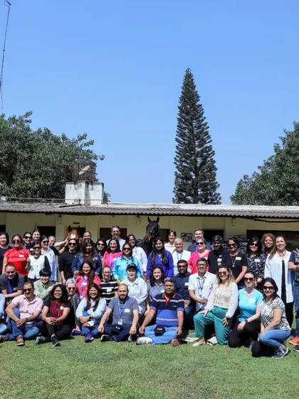 A group photo of the IBM team after their inspiring Equine Assisted Learning session. Our programs are designed to empower teams and help them rediscover their potential in a unique, natural setting.