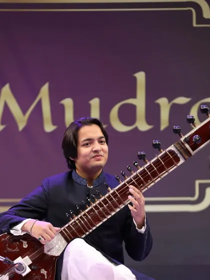 Playing for the audience at 'NaadMudra'. The stage setup and lighting created a wonderful ambiance for an evening of classical music.