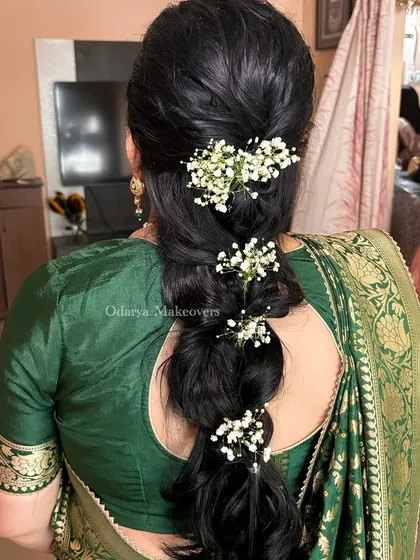 Another view of the natural mermaid braid. This shows that you don't always need extensions to achieve a beautiful and voluminous bridal hairstyle.