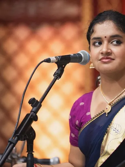 A close-up shot from the Narada Gana Sabha concert, capturing a moment of quiet contemplation between musical phrases.