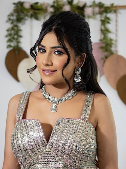 A beautiful portrait with a chic half-up hairstyle.