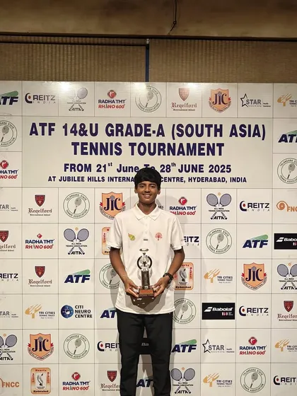 Rishikesh Mane standing proud with his trophy at the ATF Grade A South Asia tournament. Our program focuses on building the mental toughness needed to perform on big stages like this.