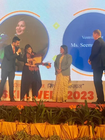 Receiving the 'Skill Hero' award for my contribution to ventriloquism and comedy. I often share this part of my journey in my talks to inspire others to pursue their own unique skills.