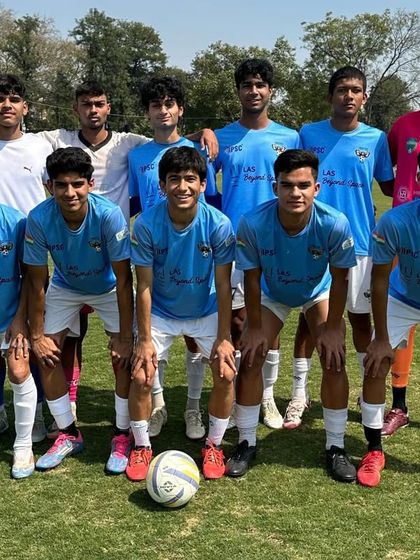 Our U-19 team before their practice match. A moment of focus and unity before stepping onto the field.