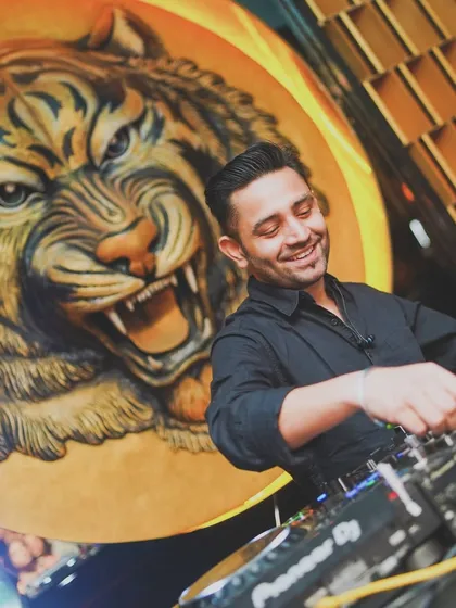 Roaring at Badmaash in Koramangala. The tiger backdrop perfectly matched the energy of the night.