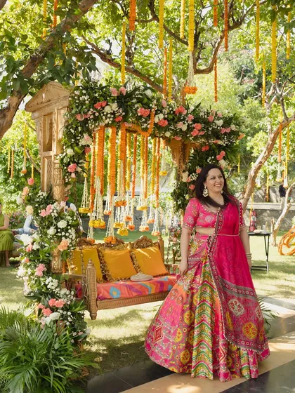 Daytime events should be full of joy and color. For this Mehendi, I designed a lush garden setting with a floral-adorned swing, creating a perfect, picturesque spot for the bride to celebrate with her loved ones.