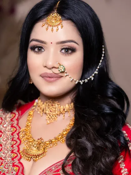A full-face shot of the student's South Indian bridal makeup, demonstrating their ability to create a complete, professional look from scratch.