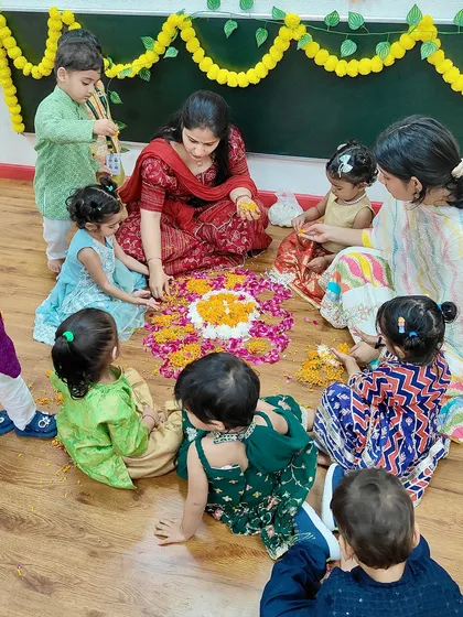 Little hands creating a beautiful flower rangoli for Diwali. I encourage children to participate in traditional activities to learn the meaning behind our festivals.