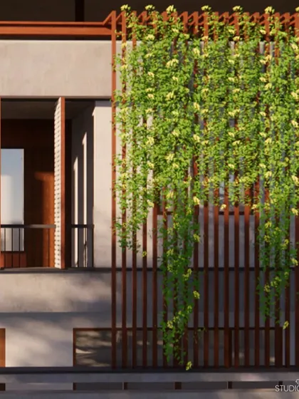 To enhance privacy and manage sunlight in this residence, we designed a facade with a vertical wooden trellis. This feature supports climbing plants, creating a living green screen that adds a natural, biophilic element to the building's exterior.
