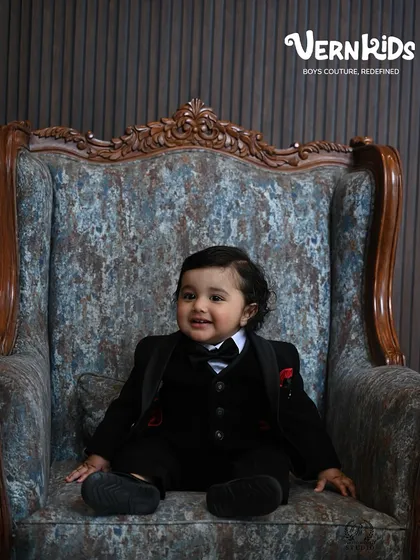 Seated like royalty. Our bespoke tuxedos are crafted to make your son feel special, with attention to every detail from the fit to the fabric.