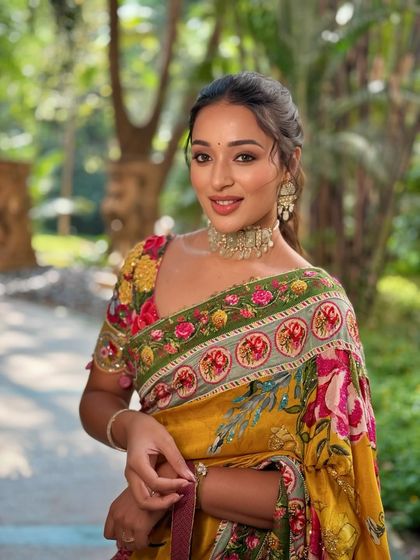 A fresh, sun-kissed look paired with a breathtaking floral Gazal Gupta couture saree.