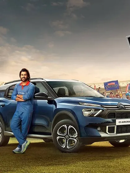 I had the opportunity to style the legendary MS Dhoni for this Citroen "Team Dhoni" ad campaign. The goal was a cool, approachable look that matched his personality, featuring a simple blue tracksuit for this shot in a stadium full of fans.
