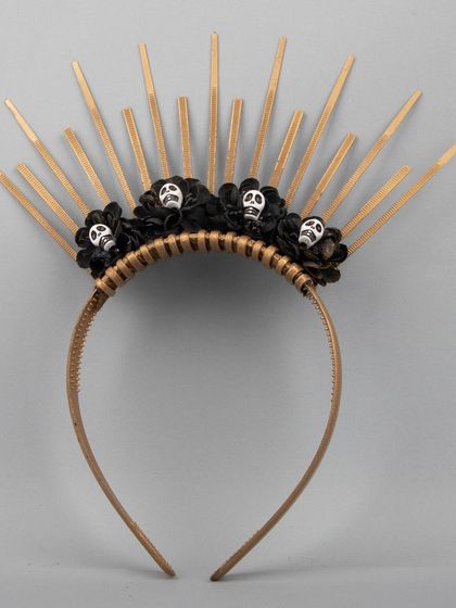 Another view of the golden skull sunburst headband.