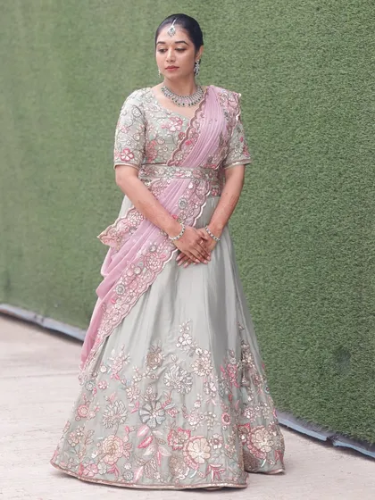 Here is the full view of this stunning floral lehenga. I crafted a soft glam makeup look with a neat, pulled-back hairstyle to ensure that the focus remained on the intricate details of the outfit while still making the client glow.