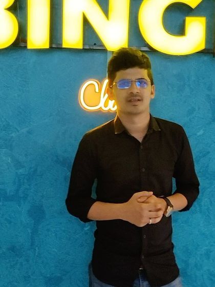 The Binge Club experience is best told through our customers. Here's another guest enjoying the ambiance in front of our glowing sign.