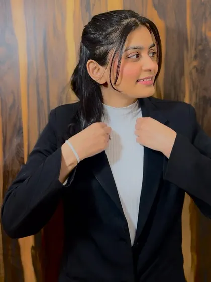 Adjusting my jacket, a small gesture of getting ready for action. In the game of law, every detail matters, from strategy to presentation.