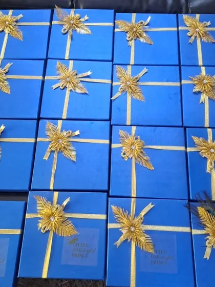 I also create return favors for other milestone events. These royal blue boxes with golden ribbon were designed as customized return hampers for a first birthday party, showing the versatility of my services.
