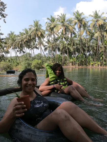 It's not all about the bike. We believe in true downtime, like this moment from our South Goa tour, relaxing in the backwaters with a local drink in hand. This is what resetting feels like.