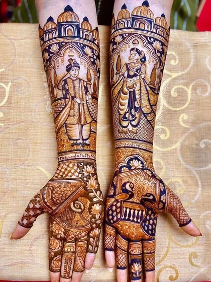 This design combines a Radha-Krishna portrait with peacock and lotus motifs, blending the spiritual and the traditional.