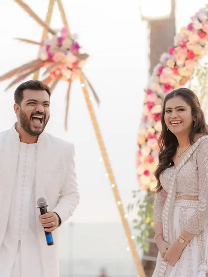A candid shot of this beautiful engagement bride, laughing and enjoying her special day. Her makeup was kept fresh and luminous to let her natural radiance shine through in her all-white ensemble.