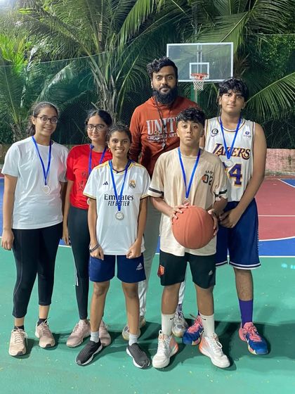 A team from the U-16 category at "The Carnival" with their coach and medals. We are proud of all our players' efforts.