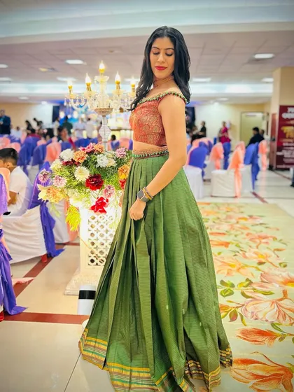 This beautiful green lehenga holds a special story. I transformed a client's mother's cherished saree into this modern, off-shoulder lehenga set. It’s a wonderful way to give sentimental fabrics a new life, blending memories with contemporary style.