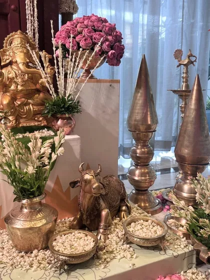 A sacred corner for new beginnings. I arranged traditional brass elements, a Ganesha idol, and fresh white and pink flowers to create a beautiful and auspicious display.