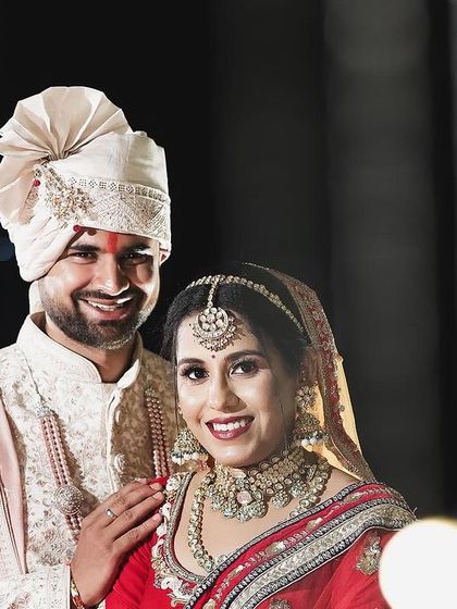 A classic, happy portrait of the bride and groom. Their smiles reflect the joy of a perfectly executed wedding day, from start to finish.