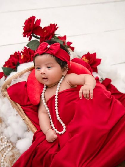 Another angle of the newborn rose theme. The overhead shot showcases the beautiful arrangement of the baby and the flowers.