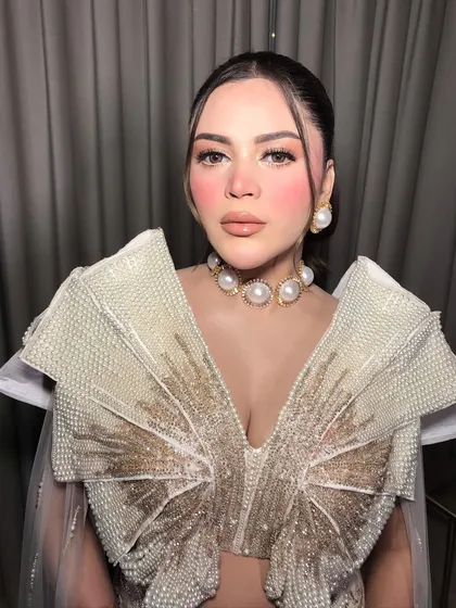 A close-up of the pearl choker, a truly unique and modern piece for a cocktail or reception.