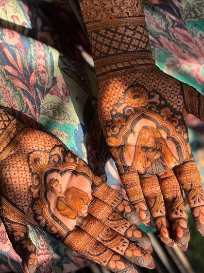 A closer look at the stunning portrait work on the palms, showcasing the level of detail that goes into my custom designs.