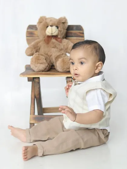 A candid moment of this little gentleman looking off to the side. These unposed shots are often my favorites.