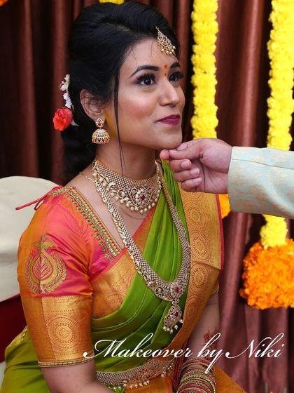 A candid moment from Nirosha's engagement. Her makeup looks fresh and beautiful even in close up shots.