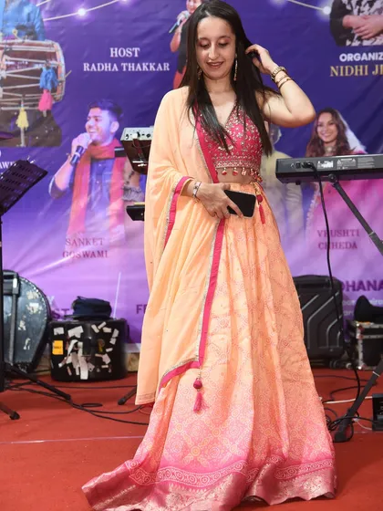 On stage at the "Shakti Raas Utsav." Organizing and choreographing for events like this is a passion, bringing together artists and dancers to celebrate our culture.