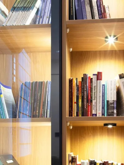 A close-up of the backlit display shelving in this custom library unit. It’s a beautiful way to showcase books and treasured objects.