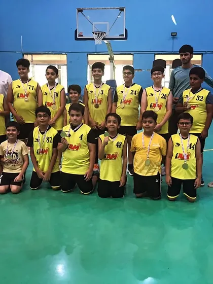 Our boys' team with their medals after a successful run in the Inter-Society Basketball Tournament.