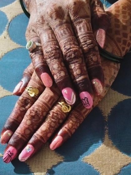 How cute is this baby shower nail art? I hand-painted little dress and butterfly designs to celebrate the mom-to-be. These special occasion sets are so much fun to create and add a personal touch to the celebration.