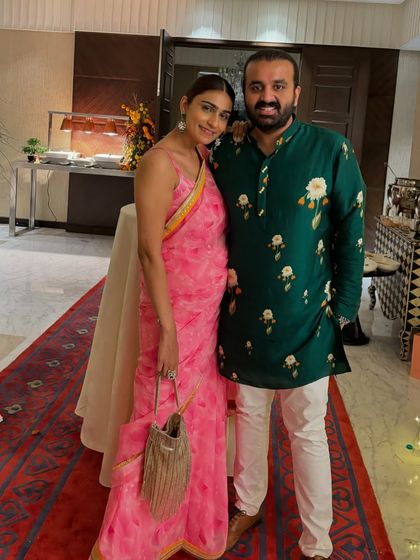 A pretty in pink moment. This lightweight printed saree is perfect for a daytime event, and the color is so fresh and feminine.