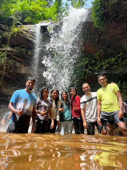 Our group enjoying a refreshing dip in a waterfall pool during the Kudremukha trek.