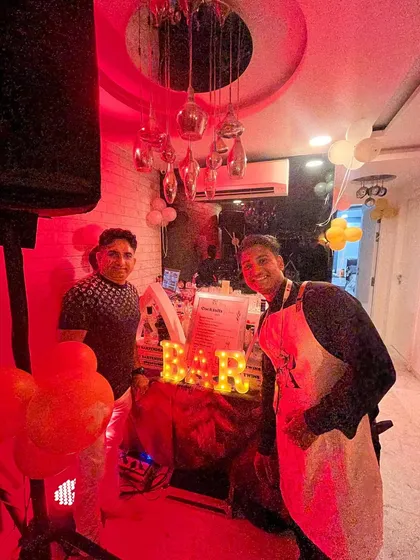 A fun, red-lit birthday party. We can use lighting to completely change the mood and atmosphere of your space.