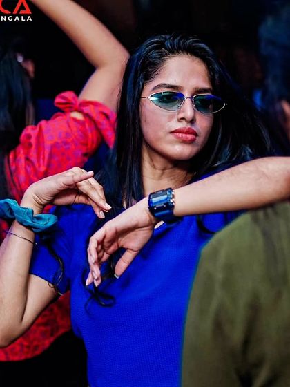 A cool and confident look from a dancer at Toca Koramangala. The crowd always brings their A-game.
