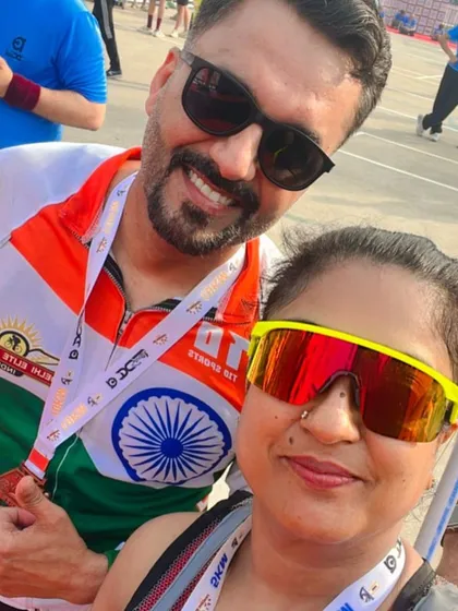 A selfie of two members with their medals. The pride and joy are evident.
