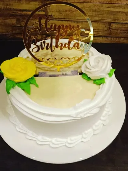 A cake that holds your memories. Our photo-pulling cake has a hidden scroll of pictures inside that can be pulled out for a wonderful birthday surprise, making your celebration truly personal.