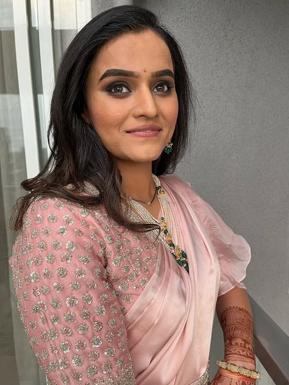 A close-up of the reception makeup. The smokey eye is blended perfectly to create a sultry and sophisticated look for the evening.