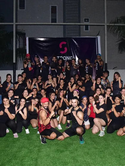 The whole crew after a banger Strong Nation masterclass in Vadodara. This is our tribe, a community of rockstars who sweat, struggle, and celebrate together.