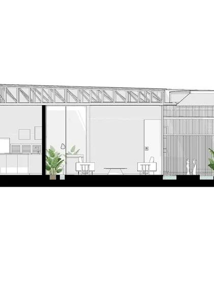 This section cut through the reception and waiting area shows the spatial arrangement and the transition from the entrance to the interior lounge, highlighting the open and flowing nature of the design.