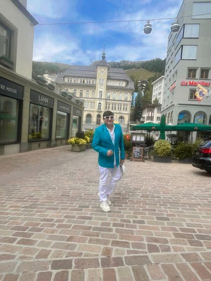 Another angle from my walk through St. Moritz, showcasing how a statement blazer can elevate a simple white outfit.
