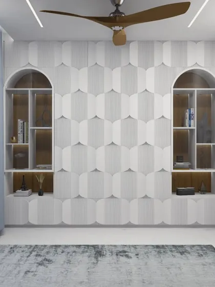 This image shows the guest bedroom with the Murphy bed folded away. The wall becomes a decorative feature with its repeating scalloped panels and integrated arched niches, transforming the room into a spacious study or lounge area.